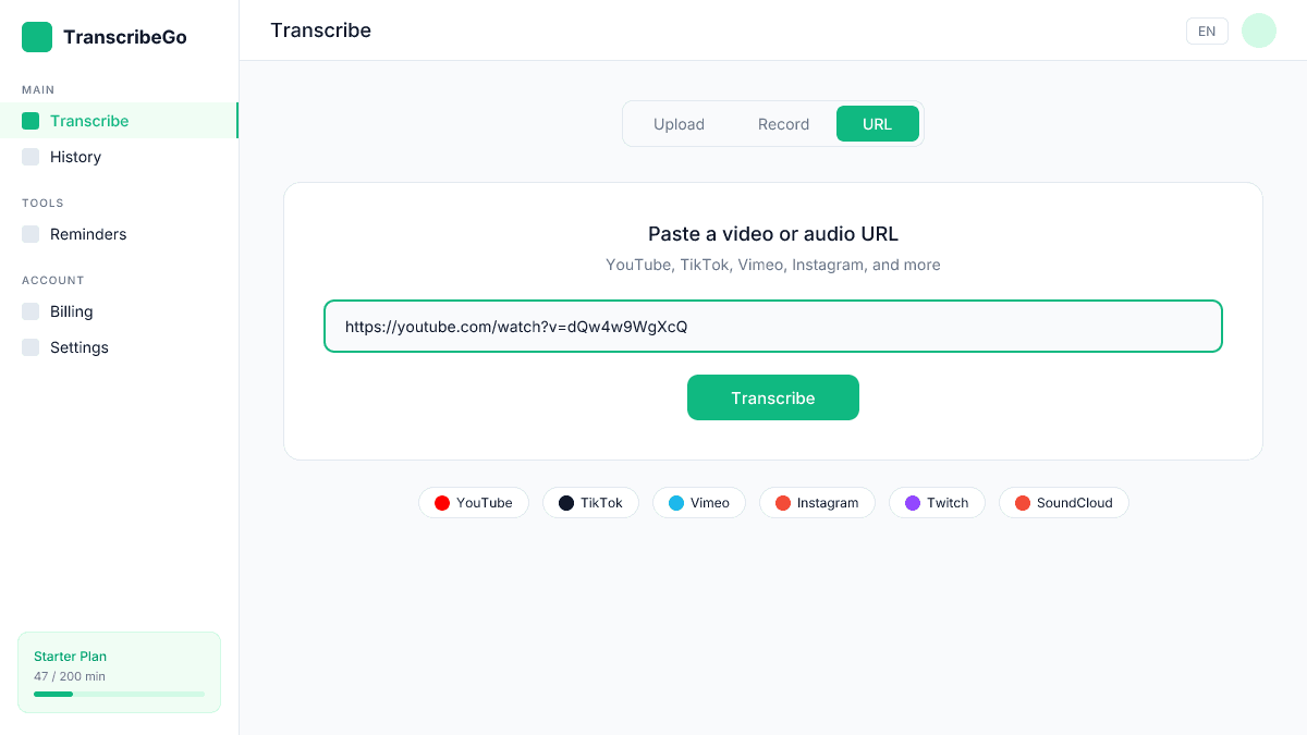 TranscribeGo URL transcription tab with a YouTube podcast URL being pasted